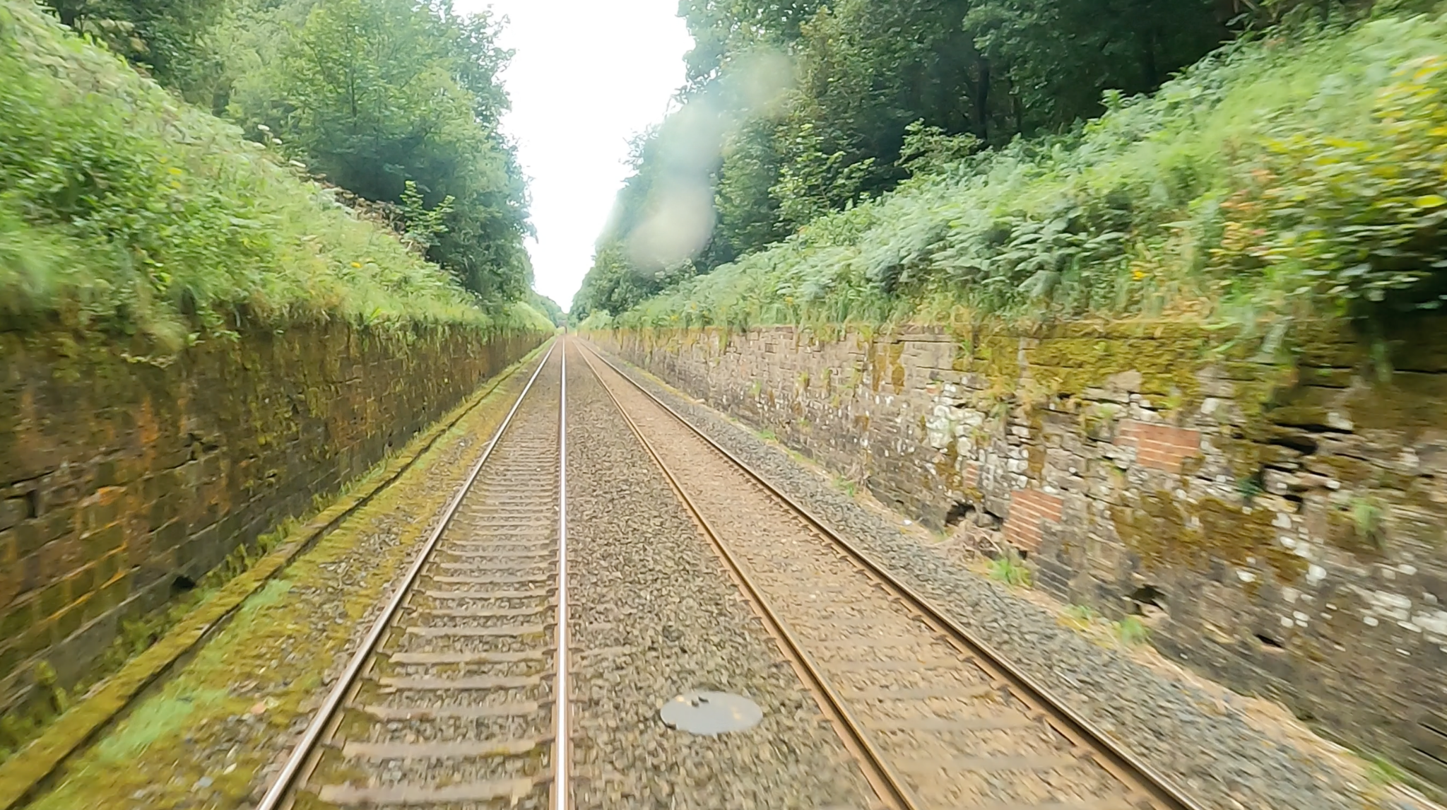 Cowran Cutting historic revetment walls with later brick repairs